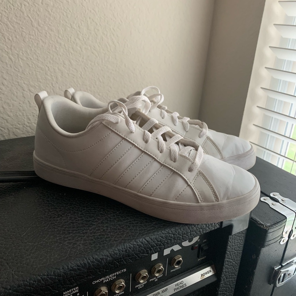 Women’s all white Adidas Superstar